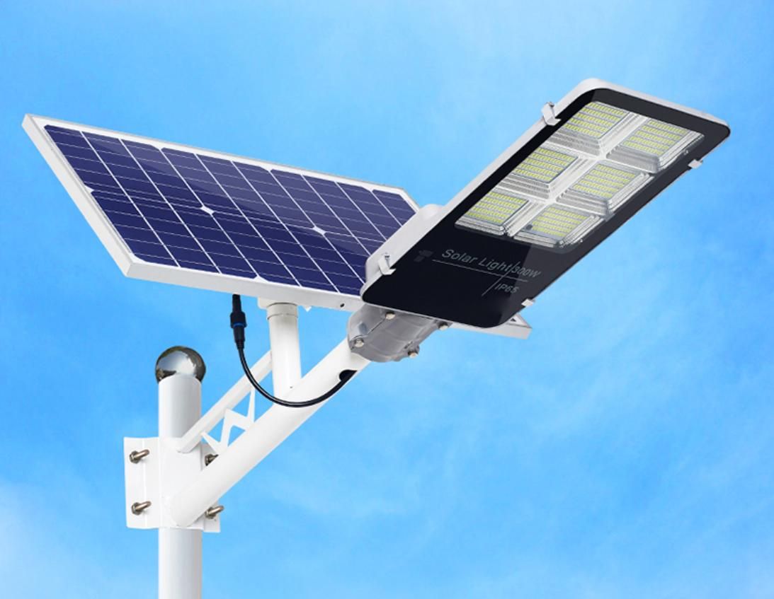Solar-powered street light installed outdoors against a clear sky